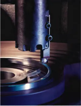 Precision machining of a custom piston ring during the manufacturing process